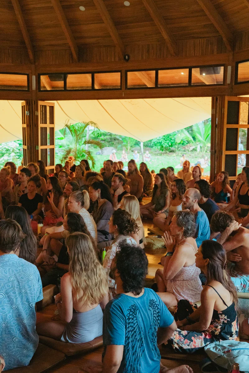 A full circle seated on the pavilion floor