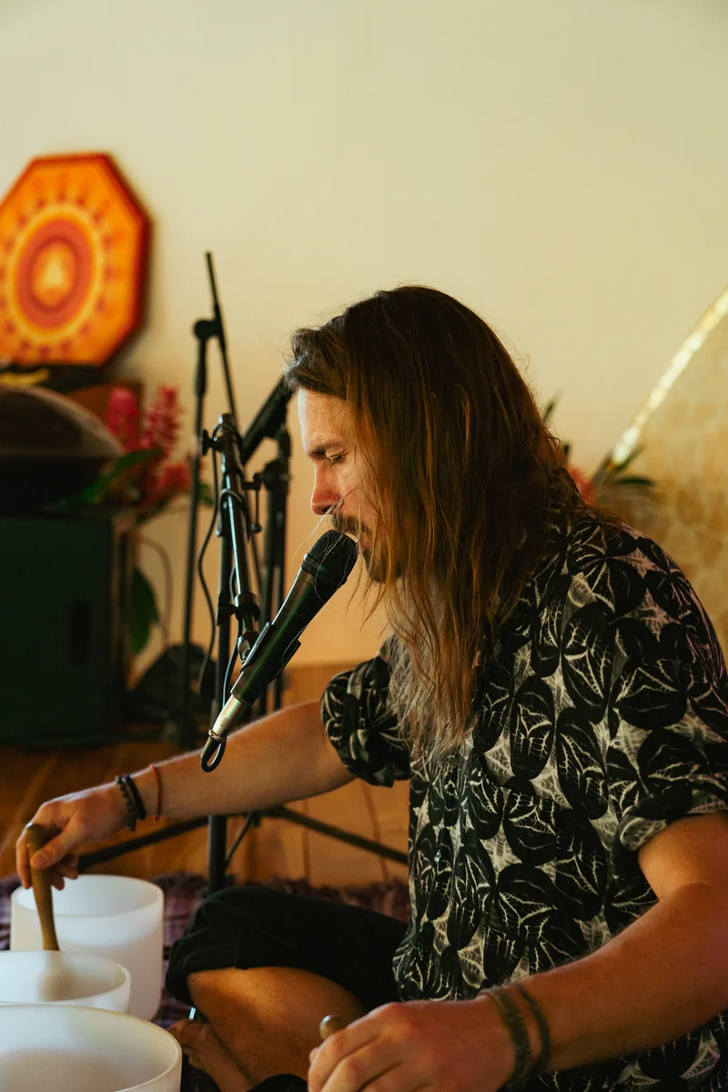 A musician singing during a sound session